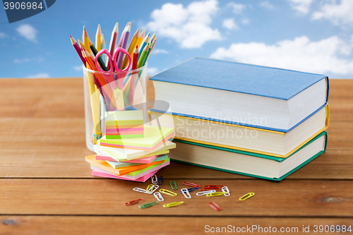 Image of close up of pens, books, clips and stickers