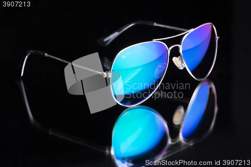 Image of colored sunglasses.