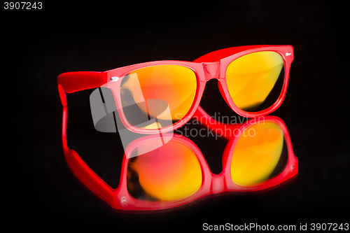 Image of colored sunglasses.