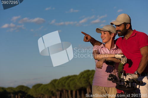 Image of portrait of couple on golf course