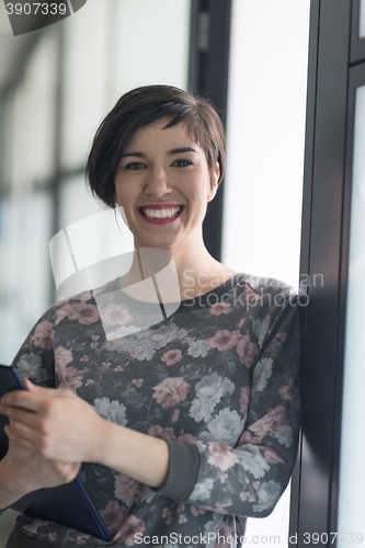 Image of portrait of business woman in casual clothes at startup office