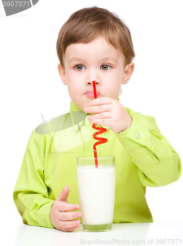 Image of Cute little boy with a glass of milk