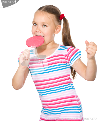 Image of Little girl with lollipop