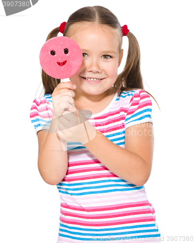 Image of Little girl with lollipop