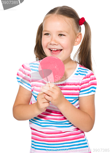 Image of Little girl with lollipop