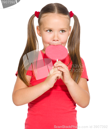 Image of Little girl with lollipop