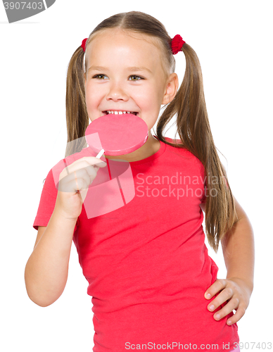 Image of Little girl with lollipop