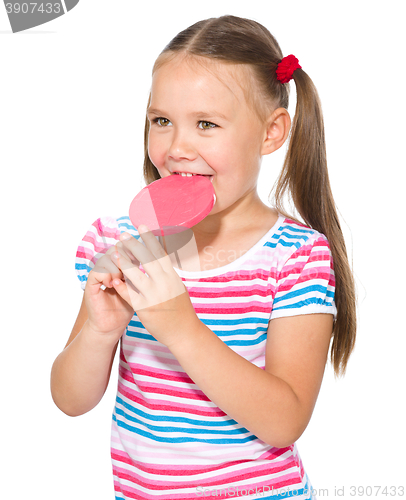 Image of Little girl with lollipop