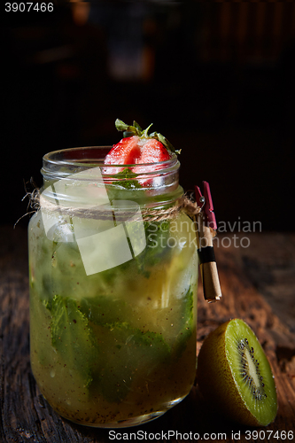 Image of Mojito cocktail drink and fruits. 