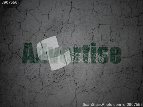 Image of Advertising concept: Advertise on grunge wall background