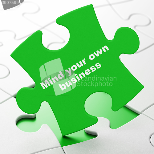 Image of Finance concept: Mind Your own Business on puzzle background