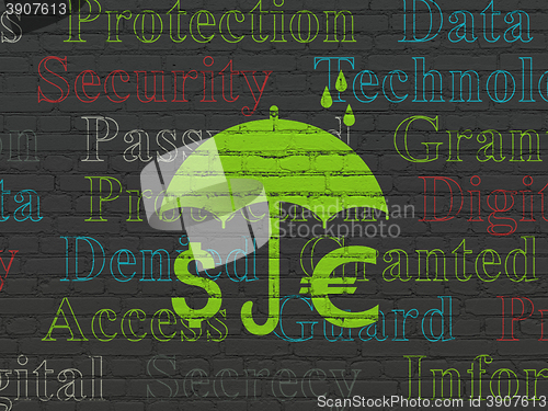 Image of Security concept: Money And Umbrella on wall background