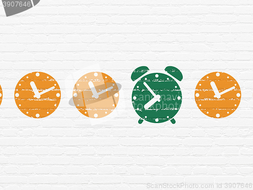 Image of Time concept: alarm clock icon on wall background