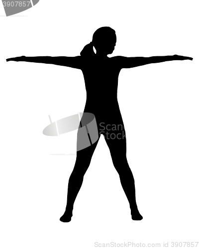 Image of Silhouette of woman doing yoga