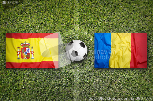 Image of Spain vs. Romania flags on soccer field