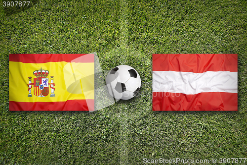 Image of Spain vs. Austria flags on soccer field