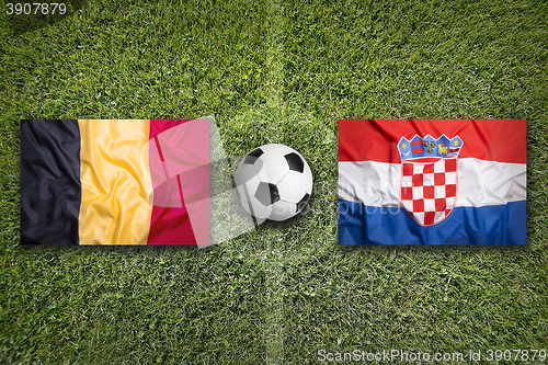 Image of Belgium vs. Croatia flags on soccer field