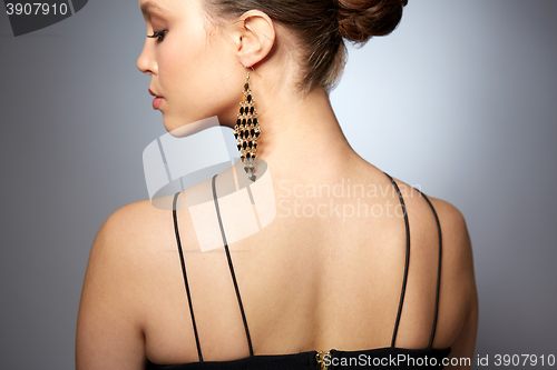 Image of close up of beautiful woman face with earring