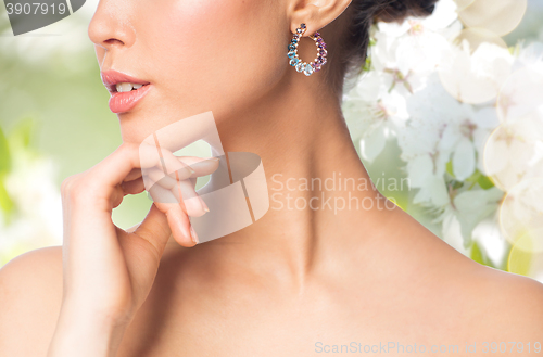 Image of close up of beautiful woman face with earring