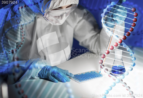 Image of close up of scientist making test in lab