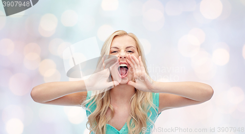 Image of angry young woman or teenage girl shouting