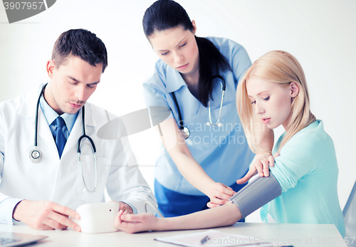 Image of doctor and patient in hospital