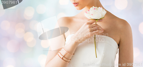 Image of close up of beautiful woman with ring and bracelet