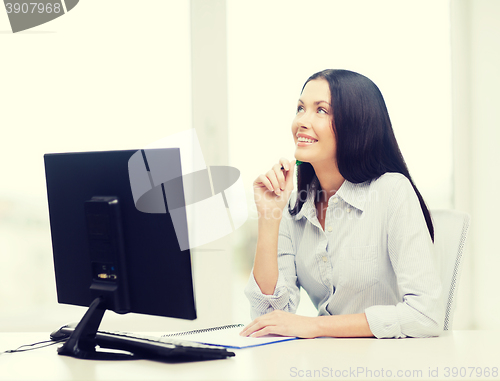 Image of smiling businesswoman or student studying