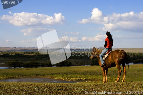 Image of Asian Girl Horse Riding