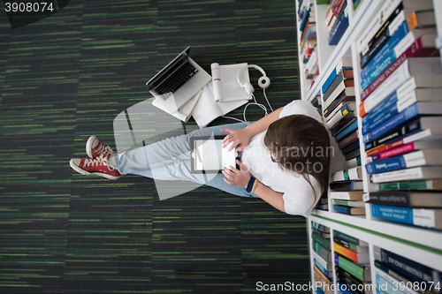 Image of female student study in library