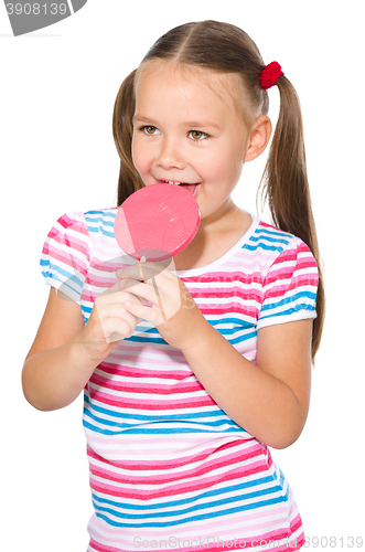 Image of Little girl with lollipop