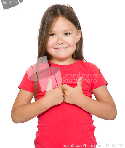 Image of Little girl is showing thumb up gesture