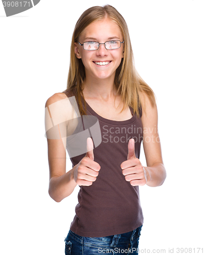 Image of Woman is showing thumb up gesture