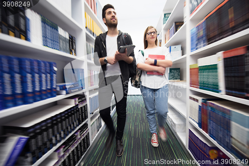 Image of students group  in school  library