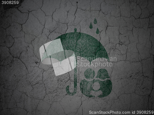 Image of Safety concept: Family And Umbrella on grunge wall background