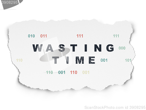 Image of Time concept: Wasting Time on Torn Paper background