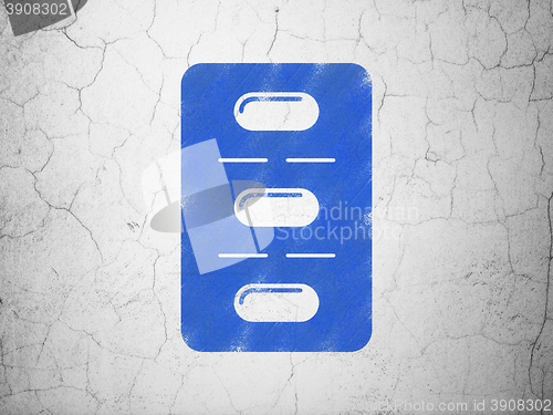 Image of Medicine concept: Pills Blister on wall background