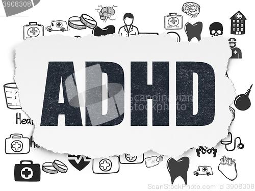 Image of Health concept: ADHD on Torn Paper background