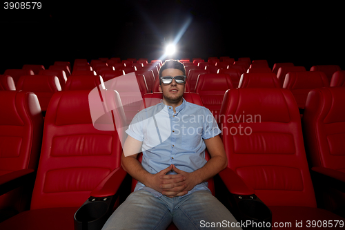 Image of young man watching movie in 3d theater