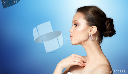 Image of close up of beautiful woman face with earring