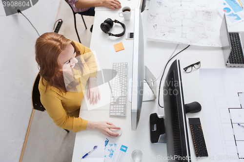 Image of smiling businesswoman or student with computer