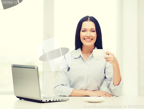 Image of smiling businesswoman or student with laptop