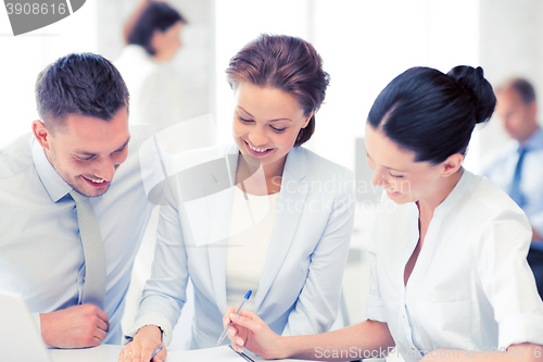 Image of business team having discussion in office