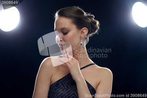 Image of beautiful young asian woman with earring