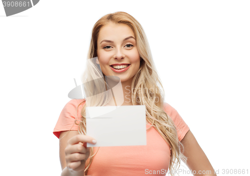 Image of happy woman or teen girl with blank white paper