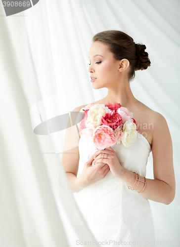 Image of beautiful asian woman with flower and jewelry