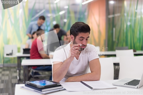 Image of male student in classroom