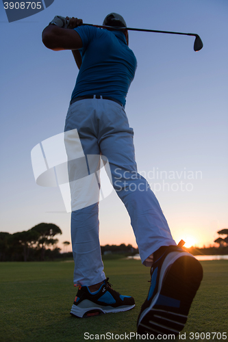 Image of golfer hitting long shot