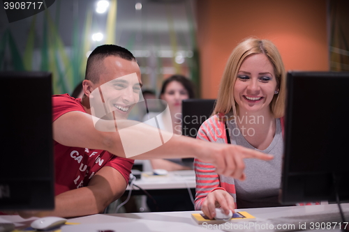 Image of technology students group working  in computer lab school  class