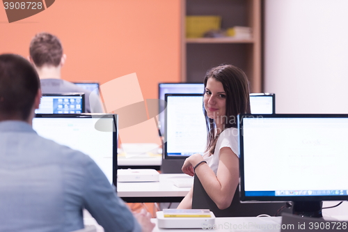 Image of technology students group in computer lab school  classroom